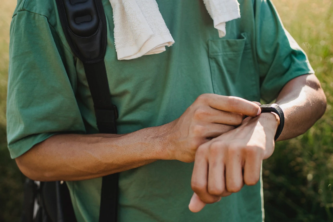 man checking watch