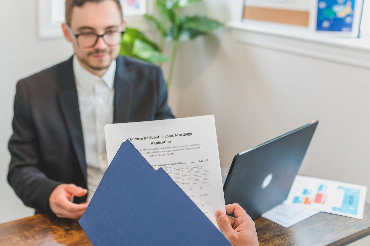 Man holding mortgage application