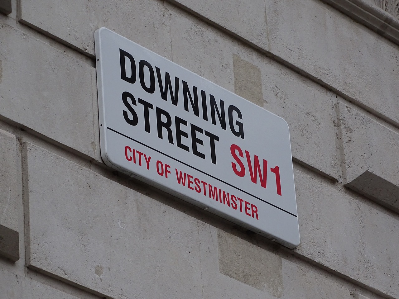 downing street sign and postcode