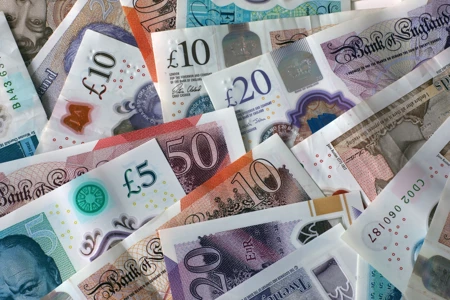 A plan view of used UK banknotes.