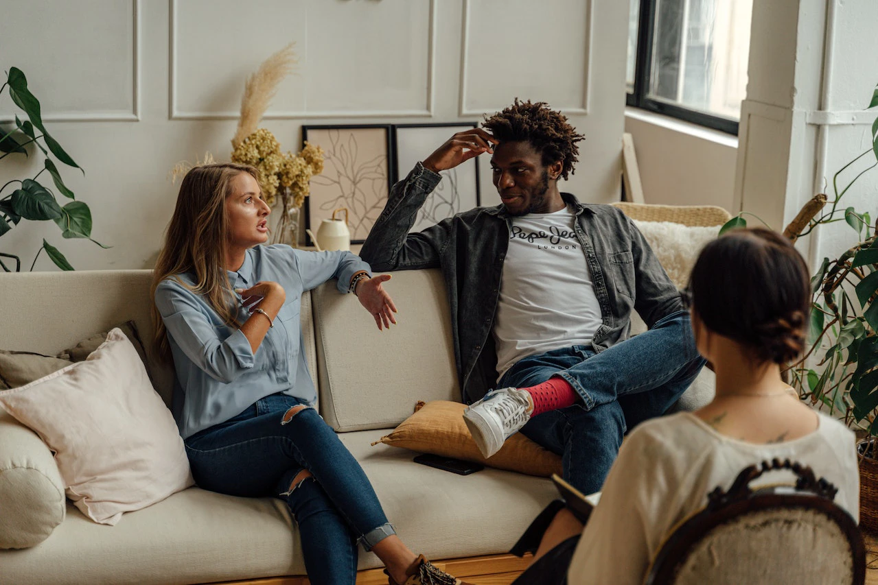 Couple talking with a mediator