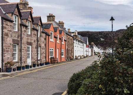 Road with houses along the side.
