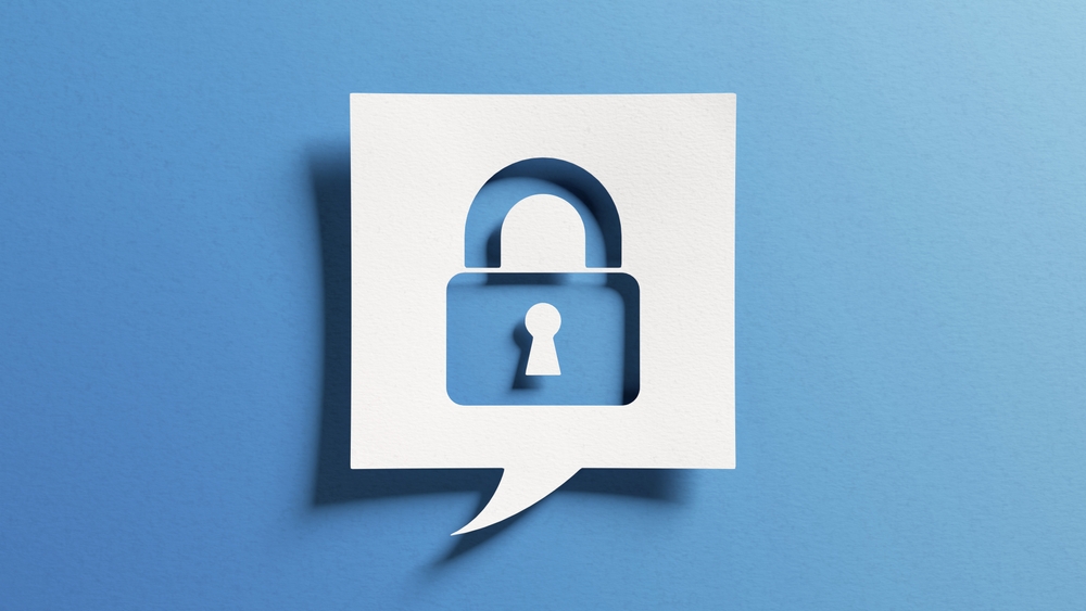 an icon of a padlock on a paper speech bubble