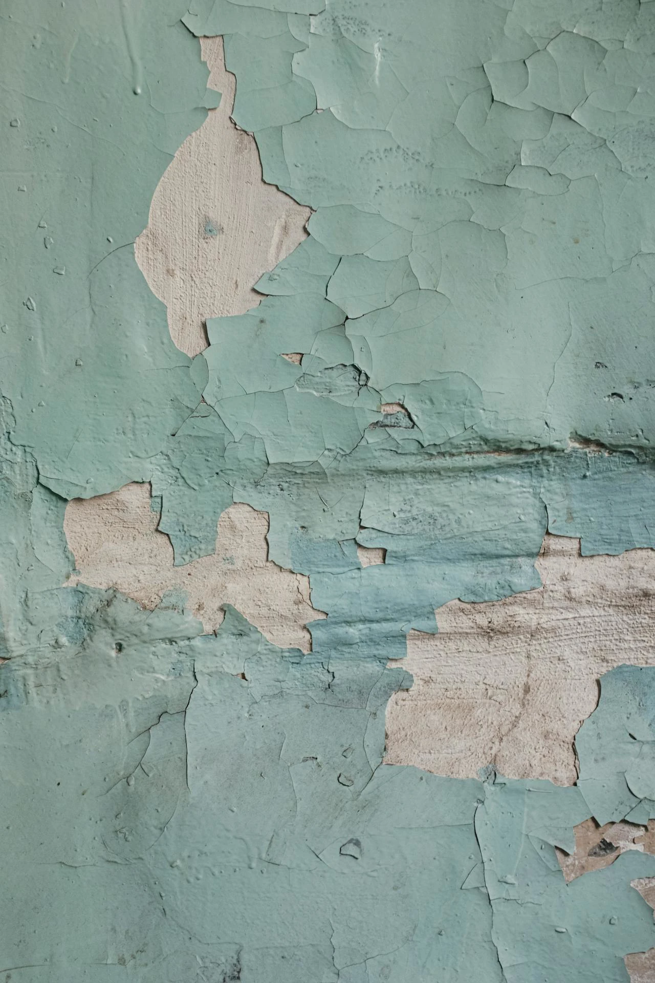 cracked and peeling painted wall