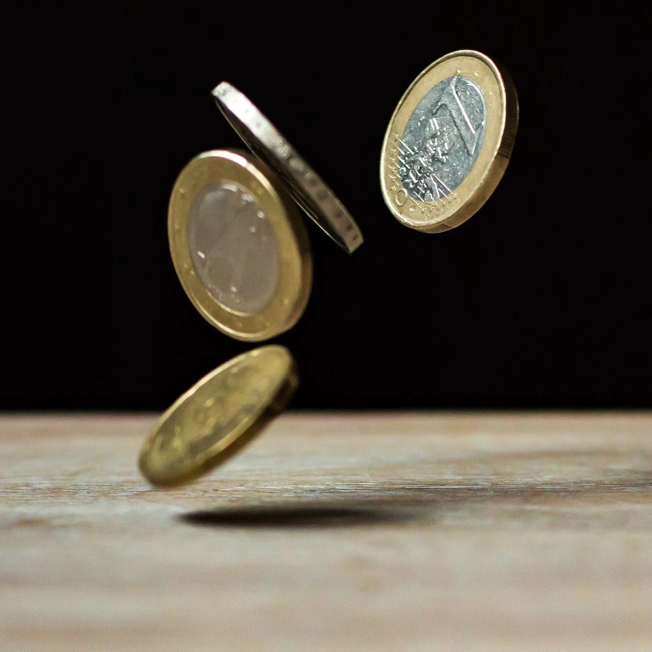 falling pound coins