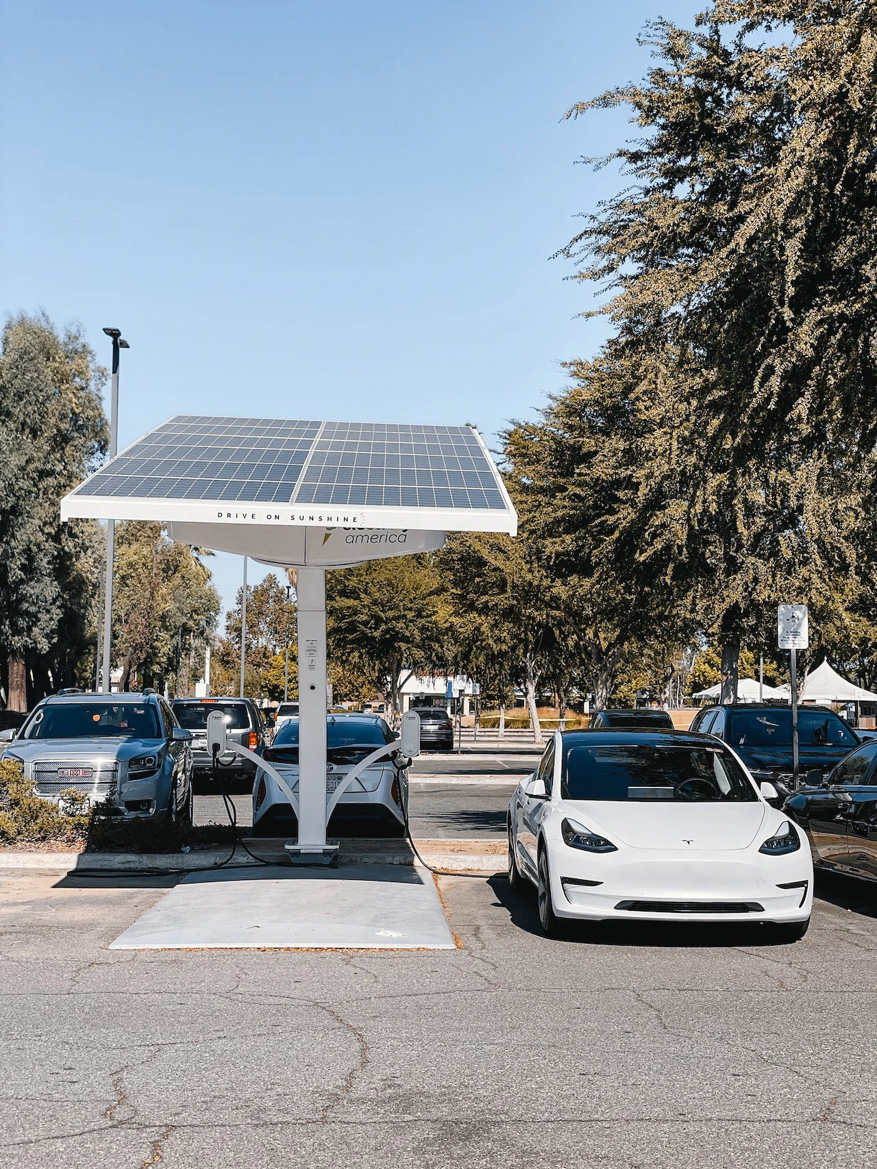 Solar panel being used to charge electric car - solar panels explained